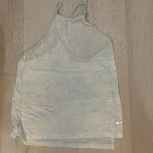 Nike Dri Fit tank top. In size small. Color is a light blue/sheer